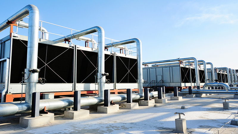 A set of cooling towers on a buildinf top