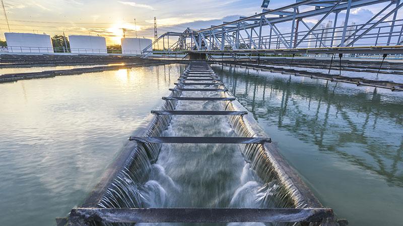 Water treatment plant at sunset