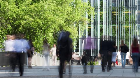 Business people walking to work brand
