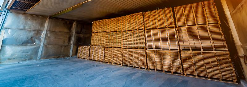 Drying wood in containers